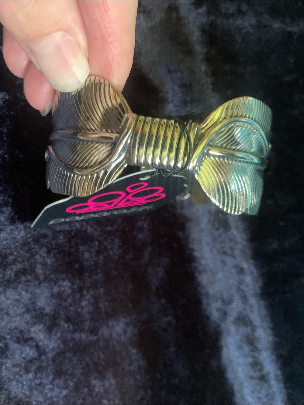 paparazzi silver toned Bow wrist Cuff